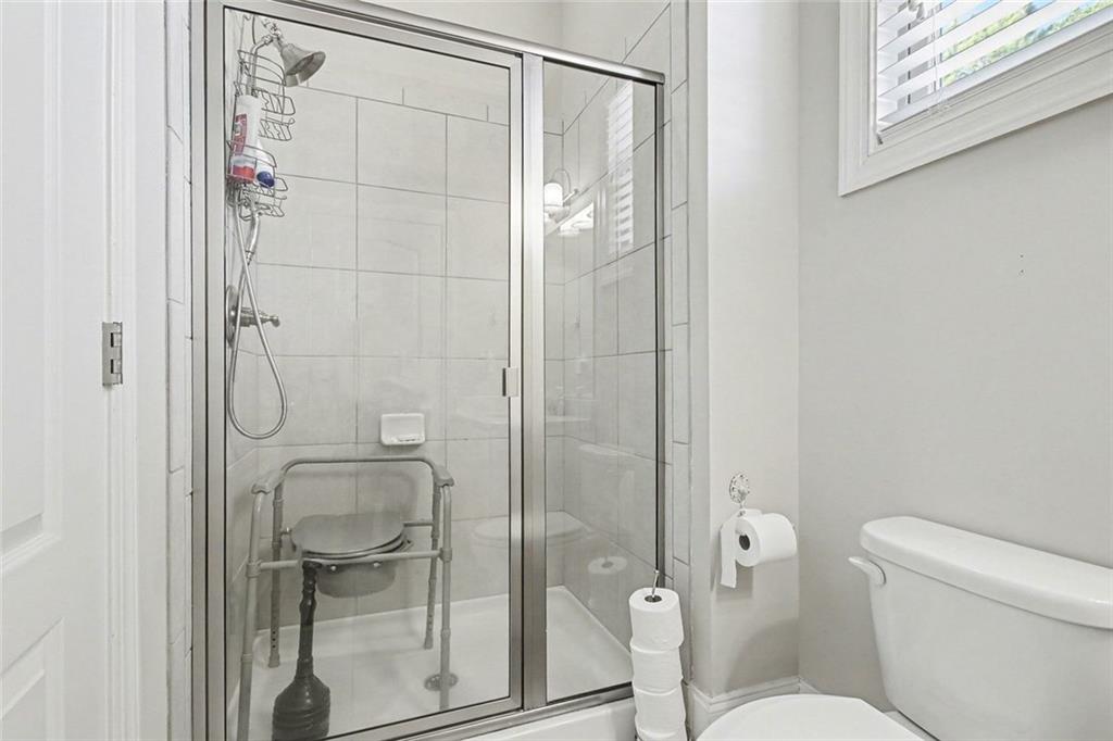 971 Traditions Way Jefferson, GA 30549 - Photo 19 of 53 a bathroom with a shower and toilet