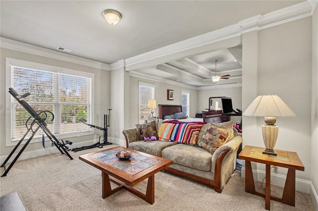 971 Traditions Way Jefferson, GA 30549 - Photo 27 of 53 a living room with furniture and a window