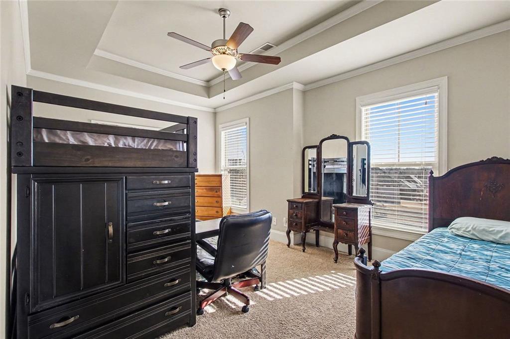 971 Traditions Way Jefferson, GA 30549 - Photo 33 of 53 a bedroom with furniture and wooden floor