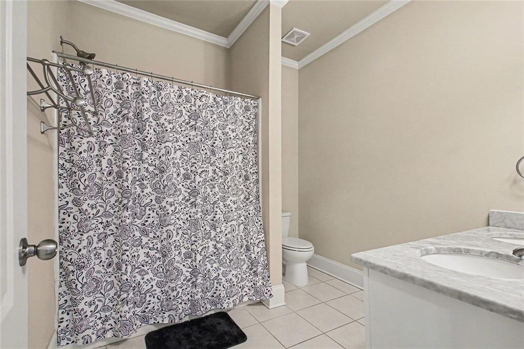 971 Traditions Way Jefferson, GA 30549 - Photo 36 of 53 a bathroom with a sink toilet and shower