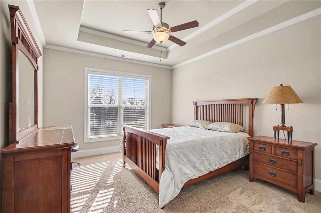 971 Traditions Way Jefferson, GA 30549 - Photo 37 of 53 a bedroom with a bed and a window