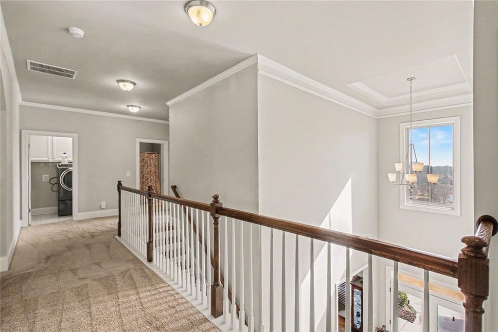971 Traditions Way Jefferson, GA 30549 - Photo 42 of 53 a view of a hallway with closet and mirror