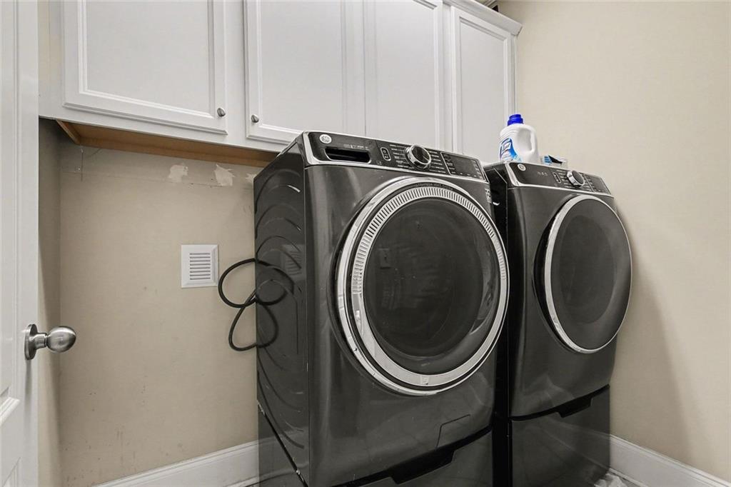 971 Traditions Way Jefferson, GA 30549 - Photo 43 of 53 a utility room with dryer and washer