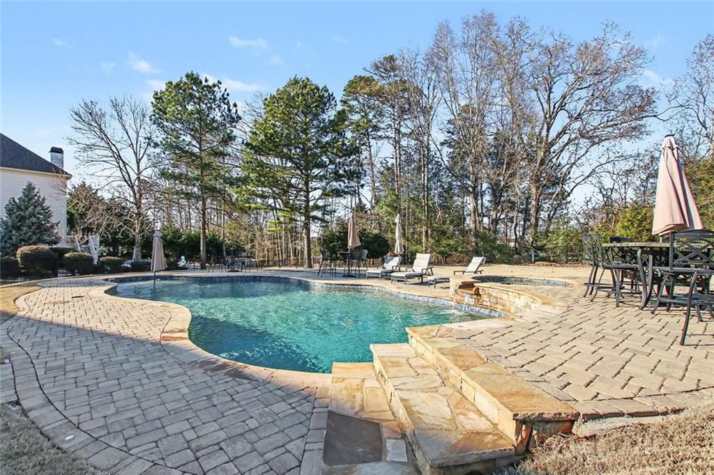971 Traditions Way Jefferson, GA 30549 - Photo 45 of 53 a view of a swimming pool with a patio