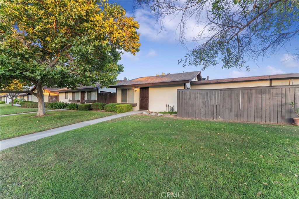 9154 Delano Drive Riverside, CA 92503 - Photo 3 of 20 a front view of a house with garden