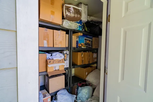 a view of a pathway with a wooden fence