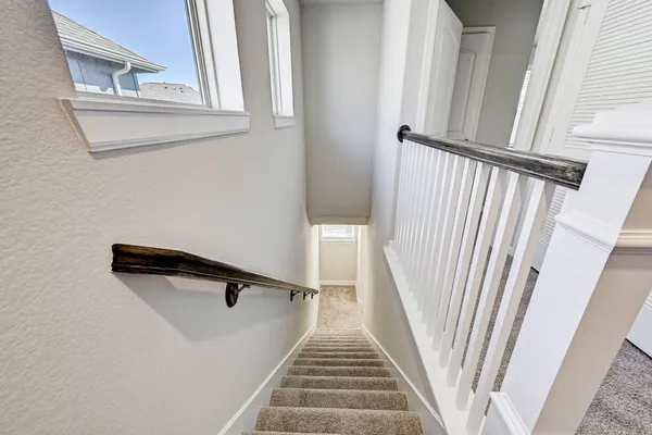 a view of entryway with wooden floor
