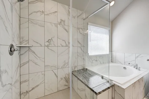 a bathroom with a sink and a bathtub