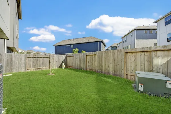 a view of a backyard with a garden