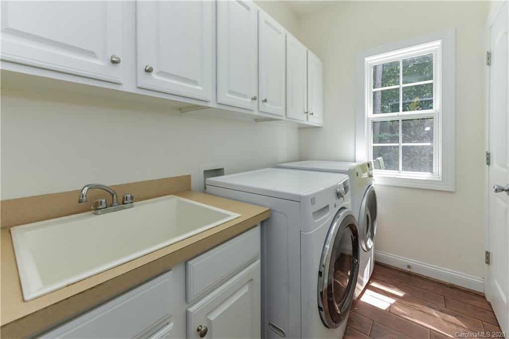 2425 Lakeview Circle Matthews, NC 28105 - Photo 17 of 33 a utility room with dryer and washer