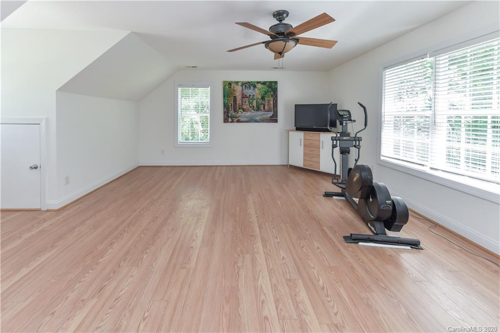 2425 Lakeview Circle Matthews, NC 28105 - Photo 19 of 33 a view of a room with gym equipment and a window