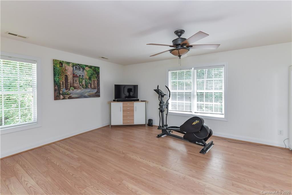 2425 Lakeview Circle Matthews, NC 28105 - Photo 23 of 33 a view of a workspace with furniture and a window