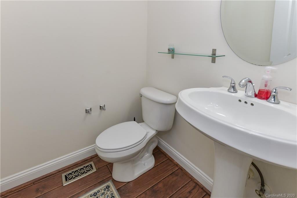 2425 Lakeview Circle Matthews, NC 28105 - Photo 26 of 33 a bathroom with a sink and a toilet