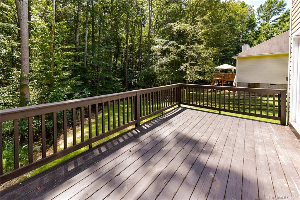 2425 Lakeview Circle Matthews, NC 28105 - Photo 31 of 33 a view of balcony with wooden floor