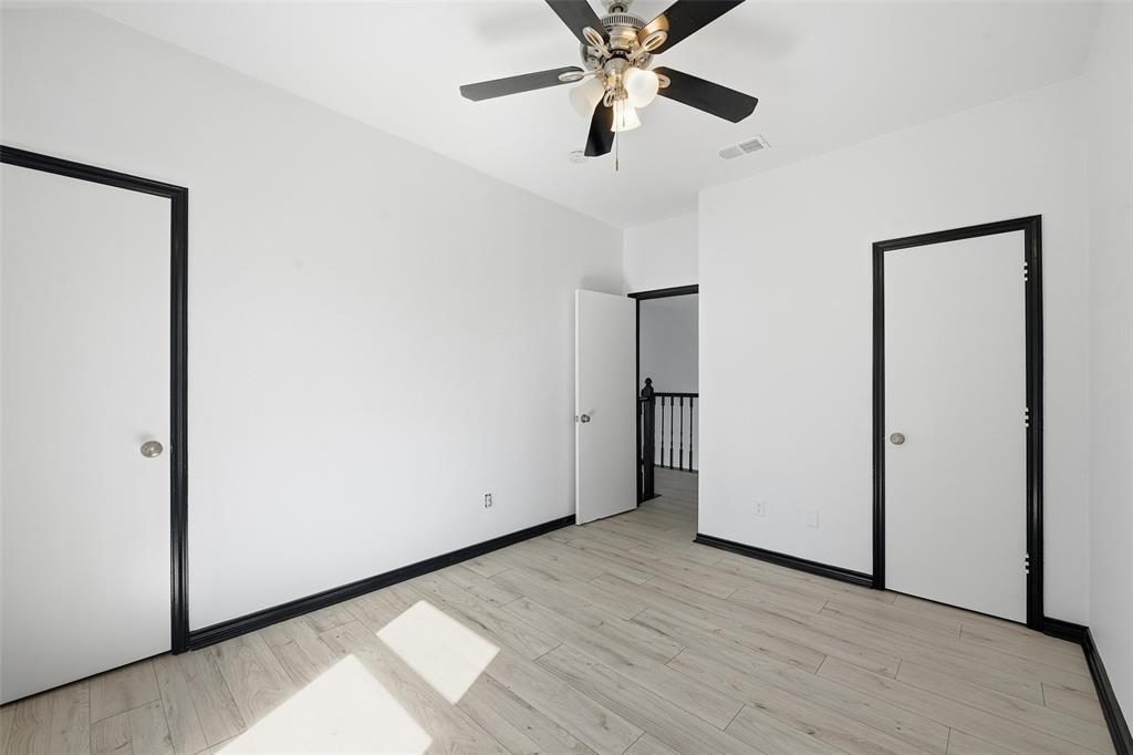 10120 Long Rifle Drive Fort Worth, TX 76108 - Photo 20 of 28 a view of an empty room with wooden floor