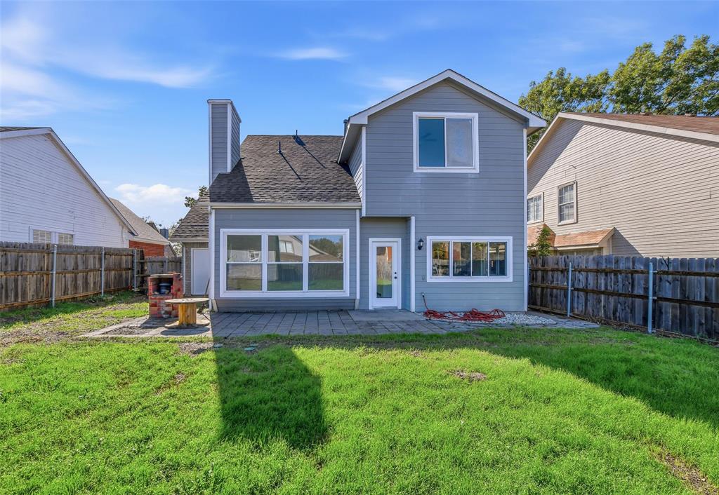 10120 Long Rifle Drive Fort Worth, TX 76108 - Photo 25 of 28 a view of a house with a yard and sitting area