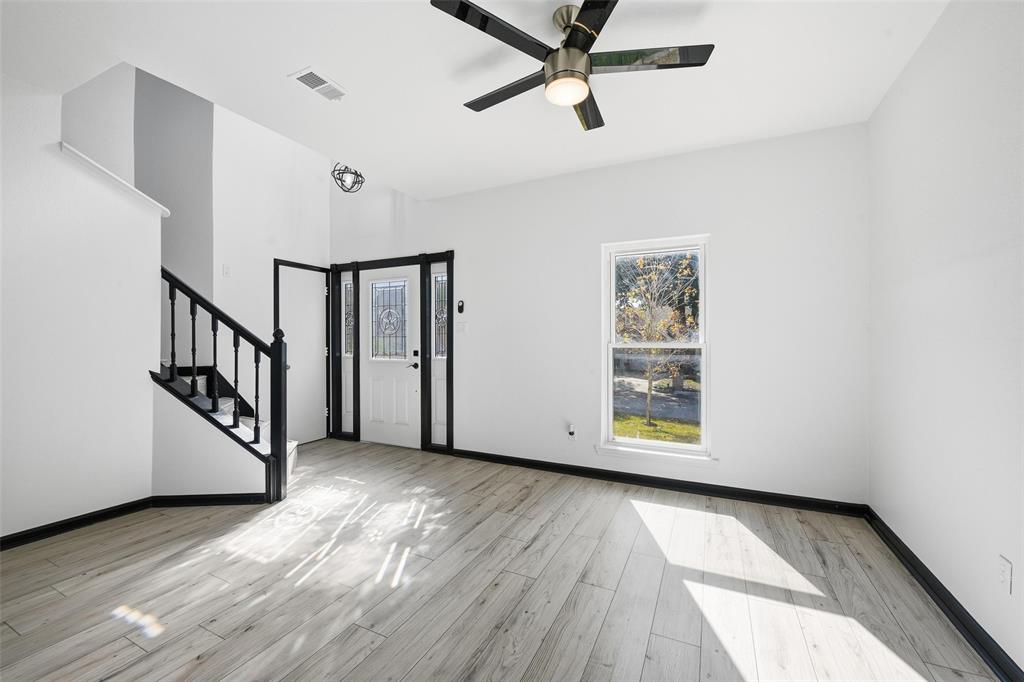 10120 Long Rifle Drive Fort Worth, TX 76108 - Photo 5 of 28 a view of a hallway with wooden floor and stairs