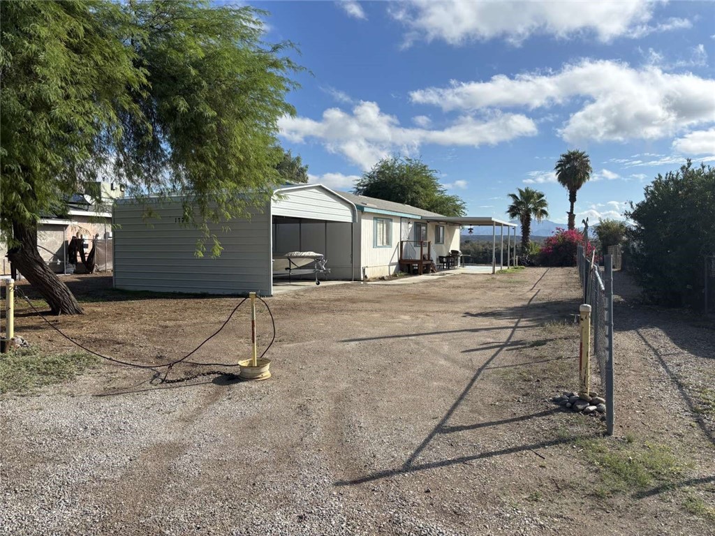 1770 Riviera Drive Blythe, CA 92225 - Photo 17 of 23 a backyard of a house with table and chairs