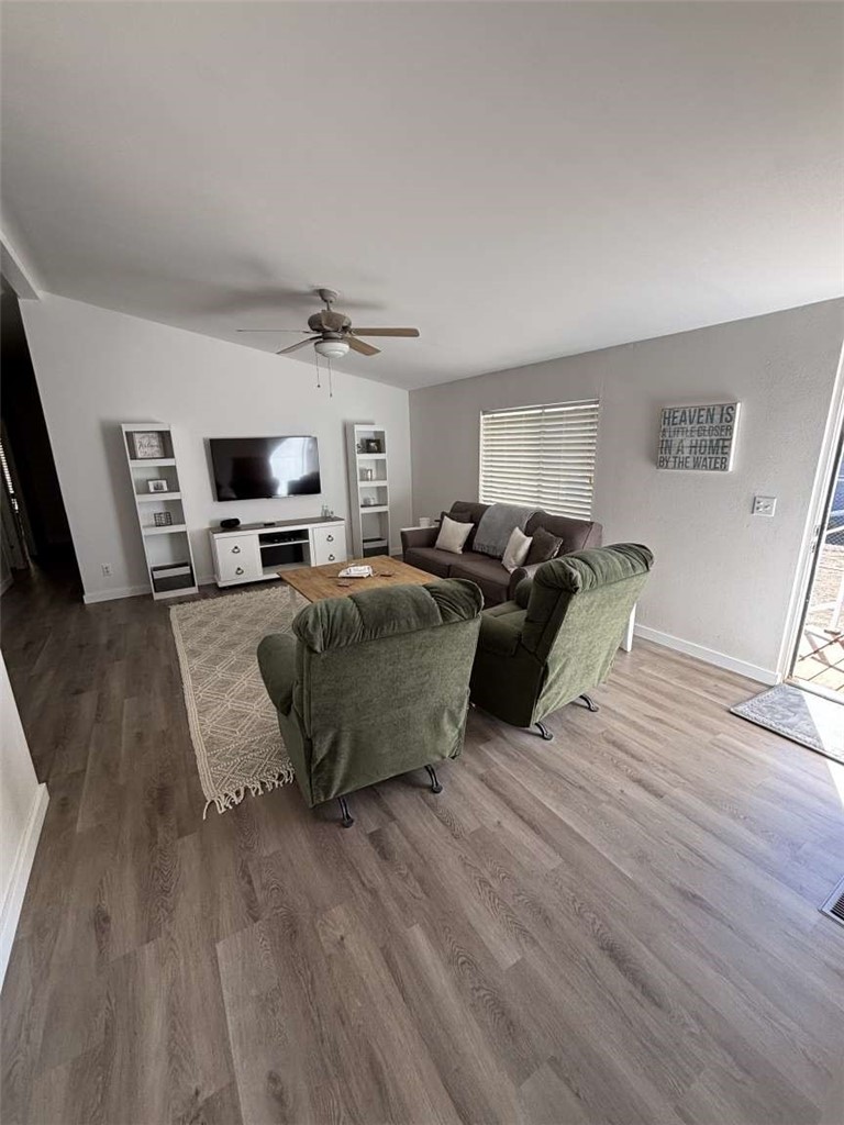 1770 Riviera Drive Blythe, CA 92225 - Photo 19 of 23 a living room with furniture flat screen tv and window