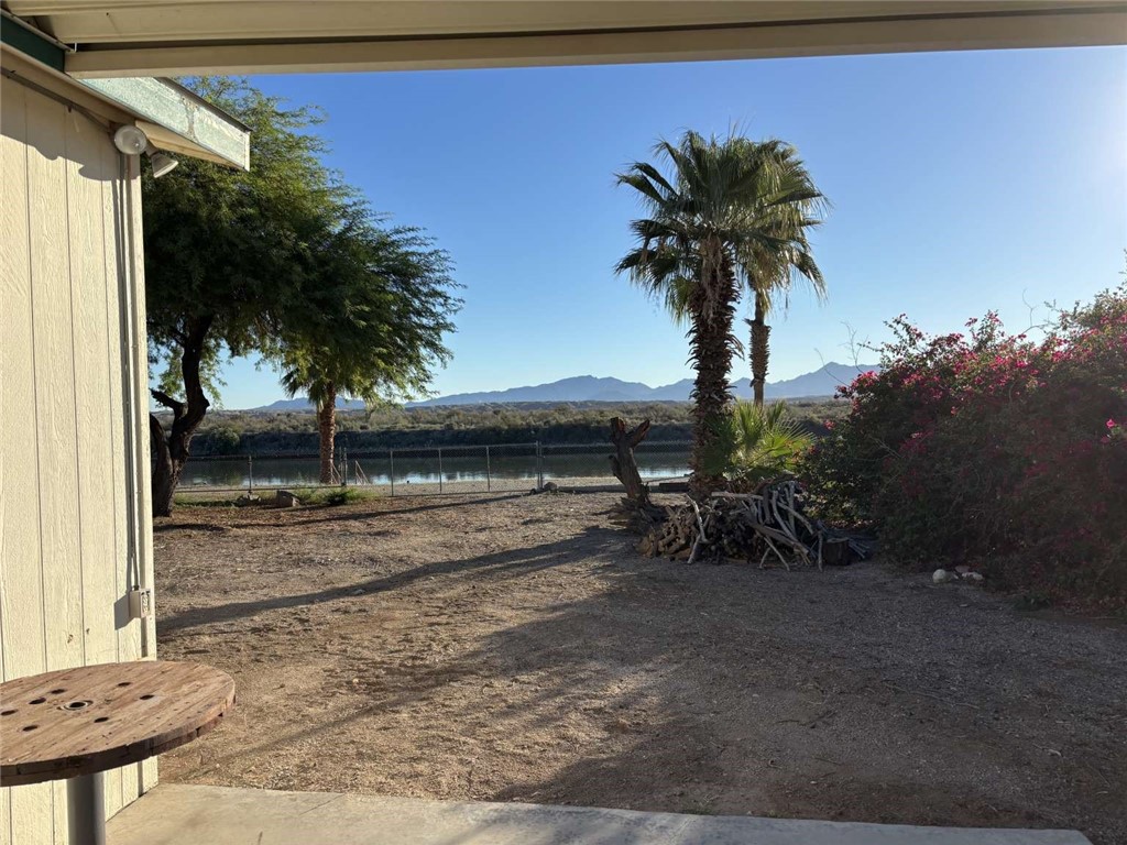 1770 Riviera Drive Blythe, CA 92225 - Photo 21 of 23 a view of a house with a yard