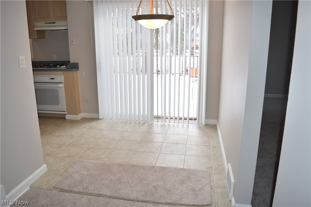 1735 Edgefield Road Lyndhurst, OH 44124 - Photo 7 of 28 Eat-in kitchen/dining that leads to the huge, beautiful backyard deck!