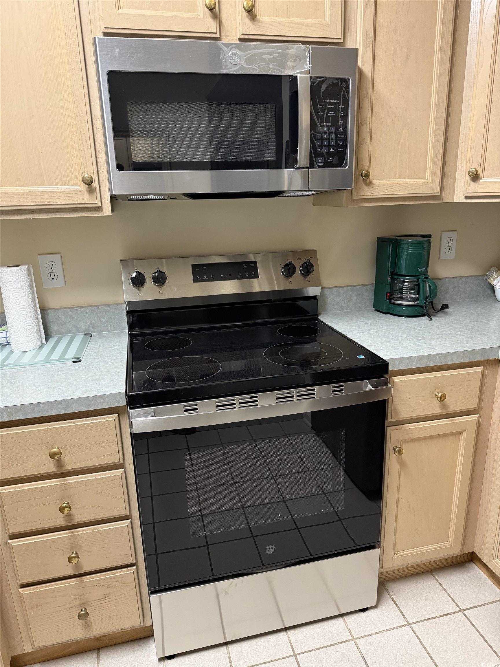 4604 Arran Court, Unit B Myrtle Beach, SC 29579 - Photo 11 of 40 Kitchen with stainless steel appliances, light brown cabinetry, and light countertops