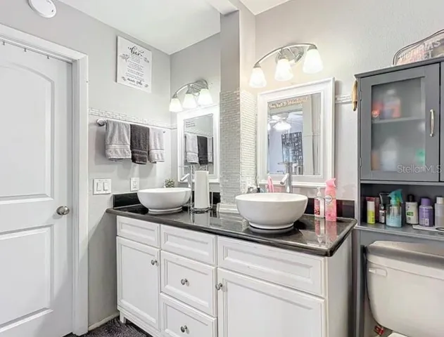 a view of living room with furniture and flat screen tv
