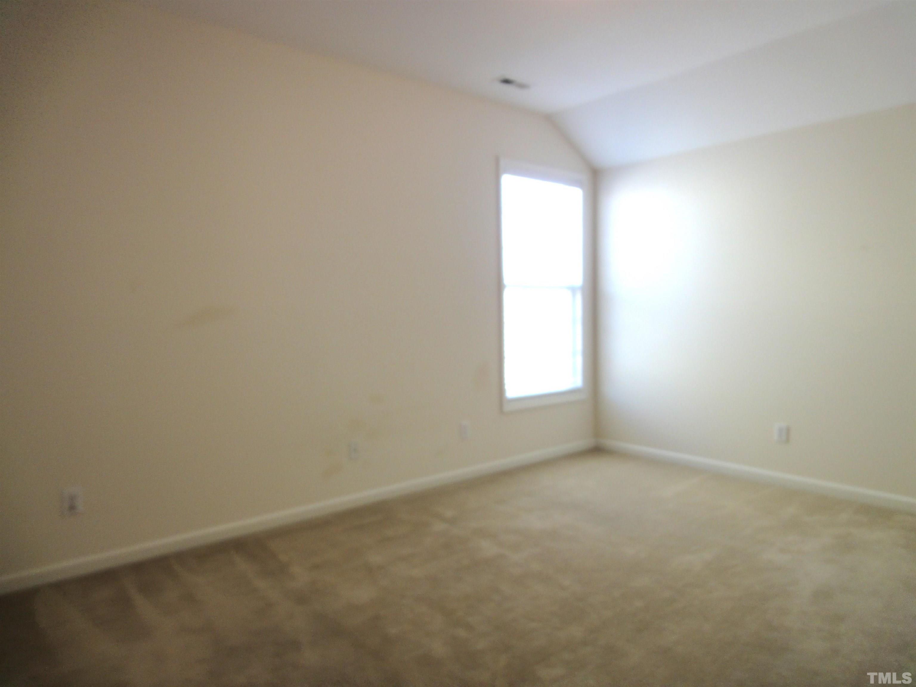 123 North Fields Circle Chapel Hill, NC 27516 - Photo 13 of 24 an empty room with a window