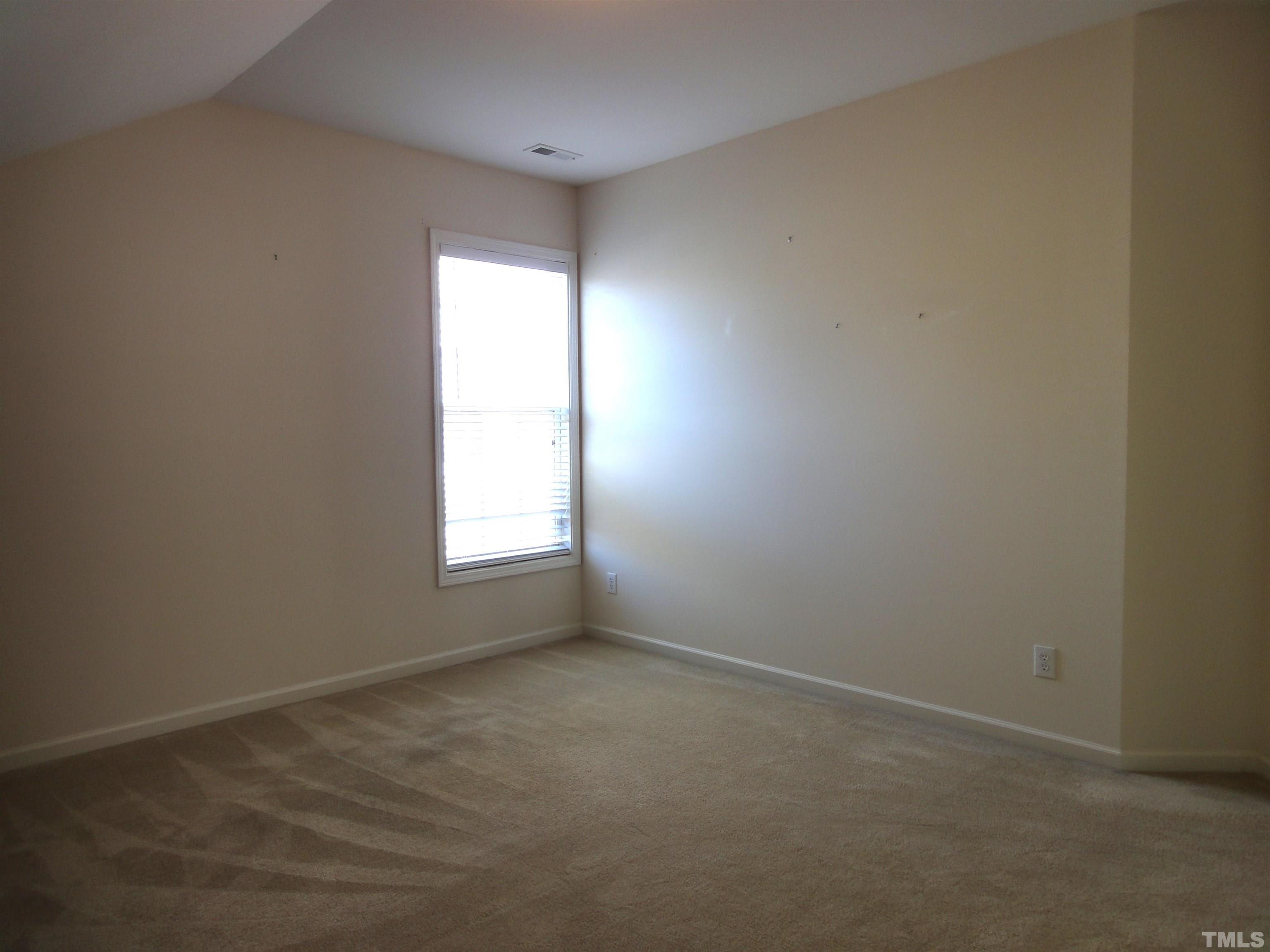 123 North Fields Circle Chapel Hill, NC 27516 - Photo 17 of 24 an empty room with a window