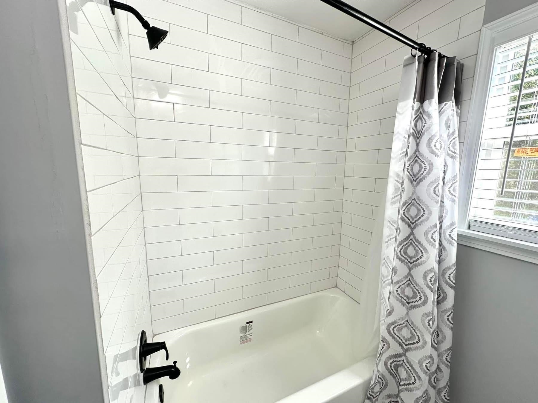 2003 Bond Ferry Road Brownsville, TN 38012 - Photo 6 of 16 Full bath featuring shower / bath combo with shower curtain