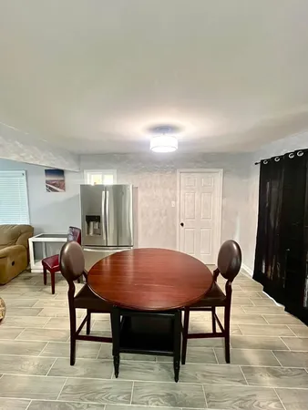 a room with furniture and window