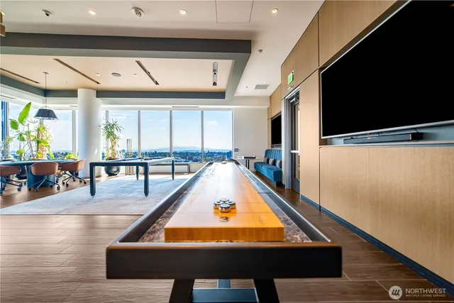 a view of swimming pool with furniture