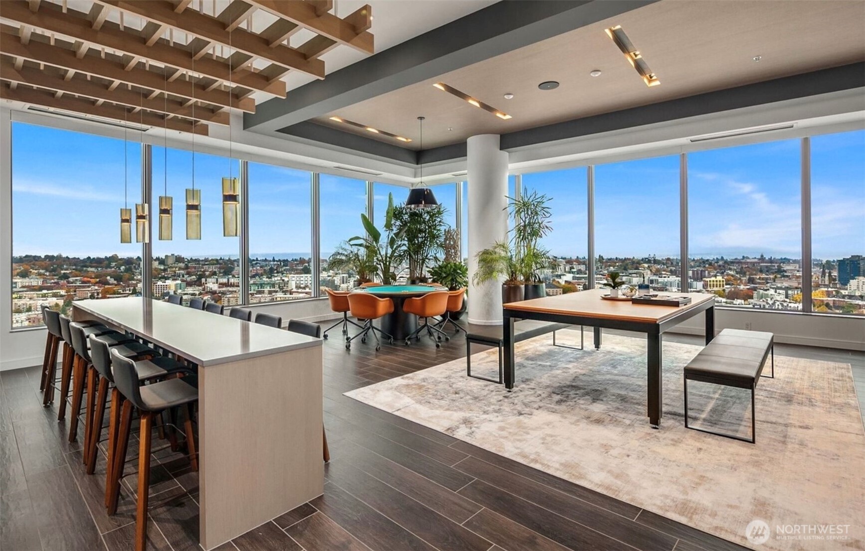 1808 Minor Avenue, Unit 912 Seattle, WA 98101 - Photo 19 of 39 a living room with stainless steel appliances kitchen island granite countertop a table chairs and a barbeque