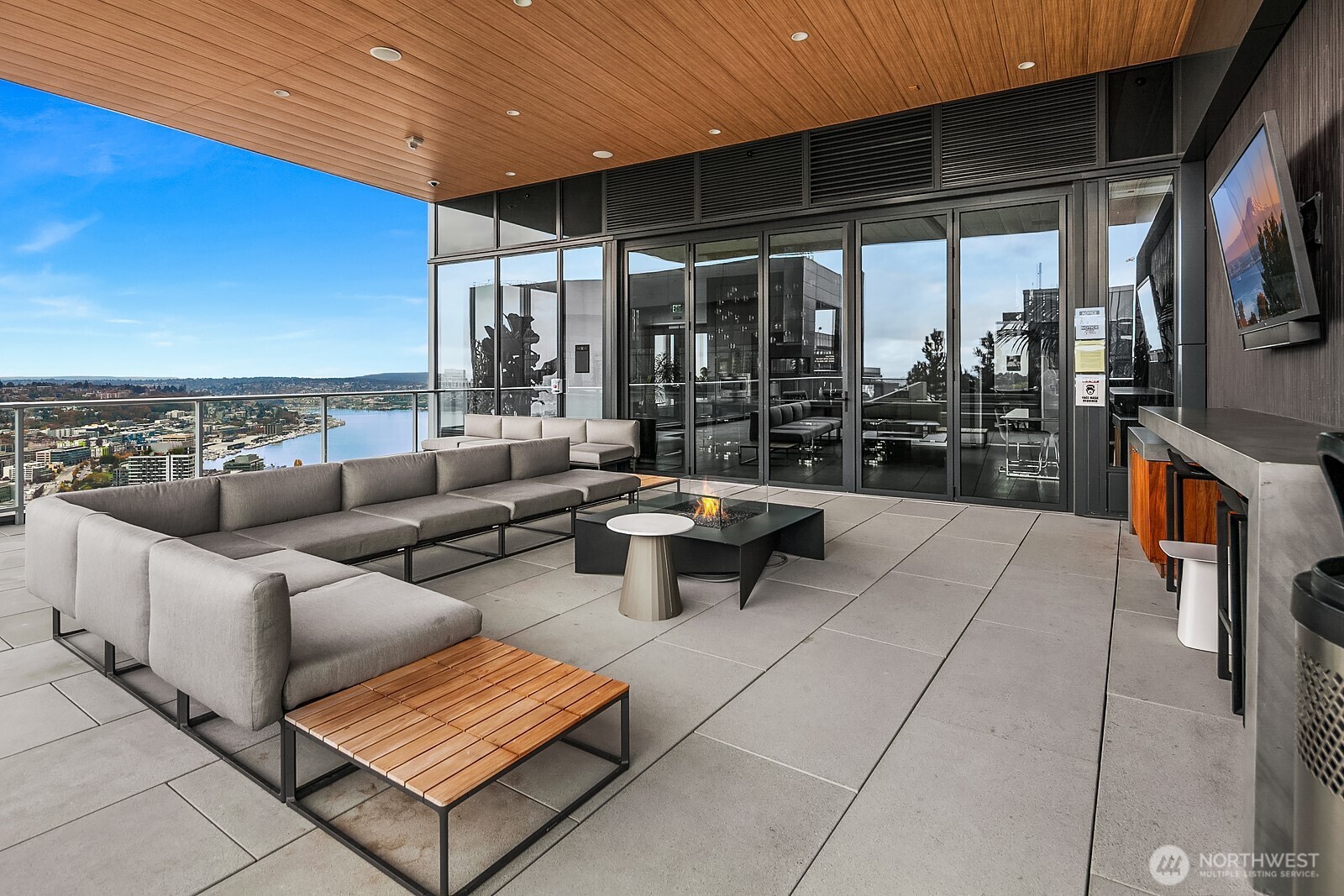 1808 Minor Avenue, Unit 912 Seattle, WA 98101 - Photo 31 of 39 a outdoor living space with furniture and a fireplace