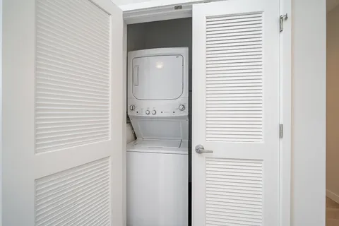 a utility room with washer and dryer