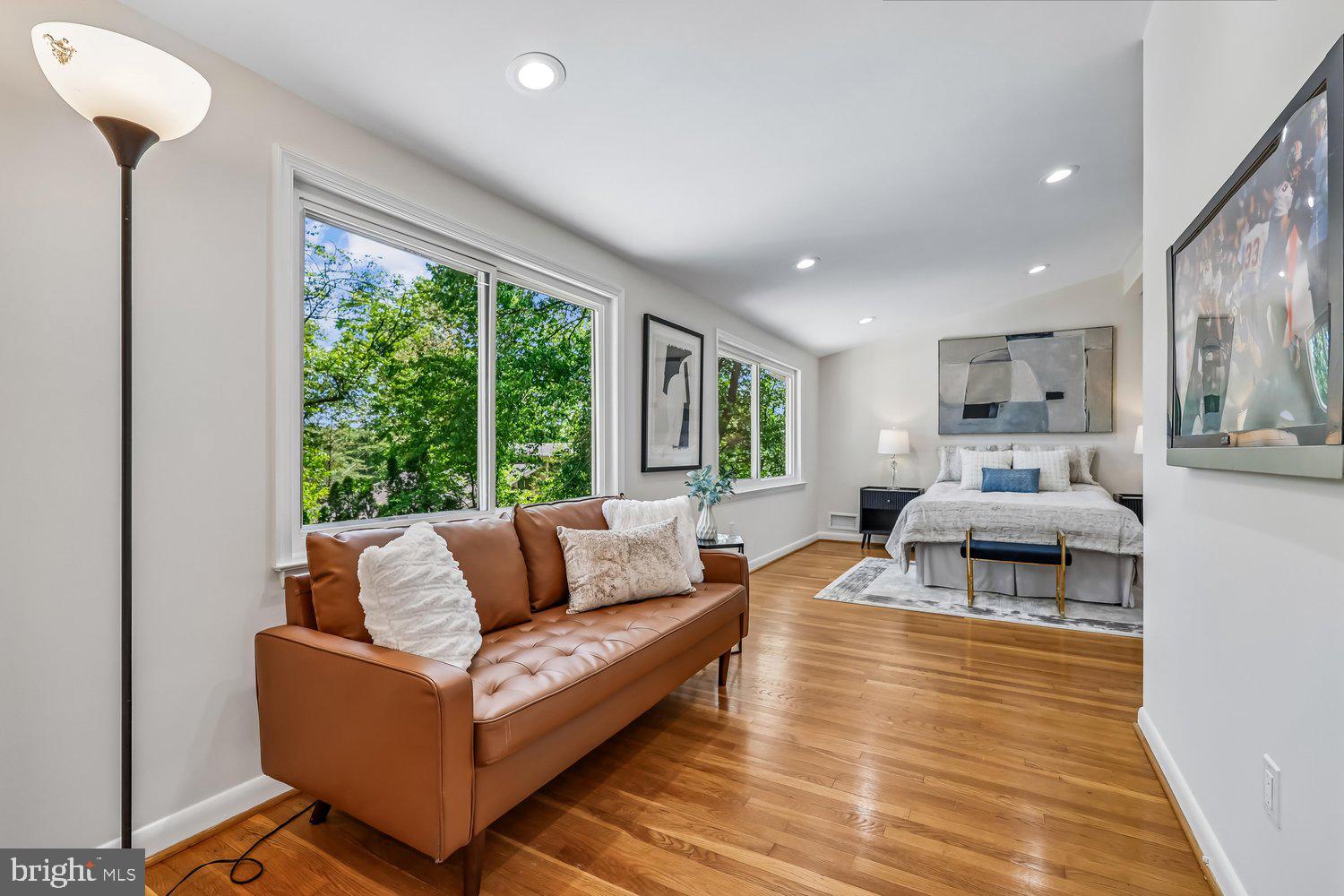 300 Gilsan Court Silver Spring, MD 20902 - Photo 60 of 117 a living room with furniture and a large window