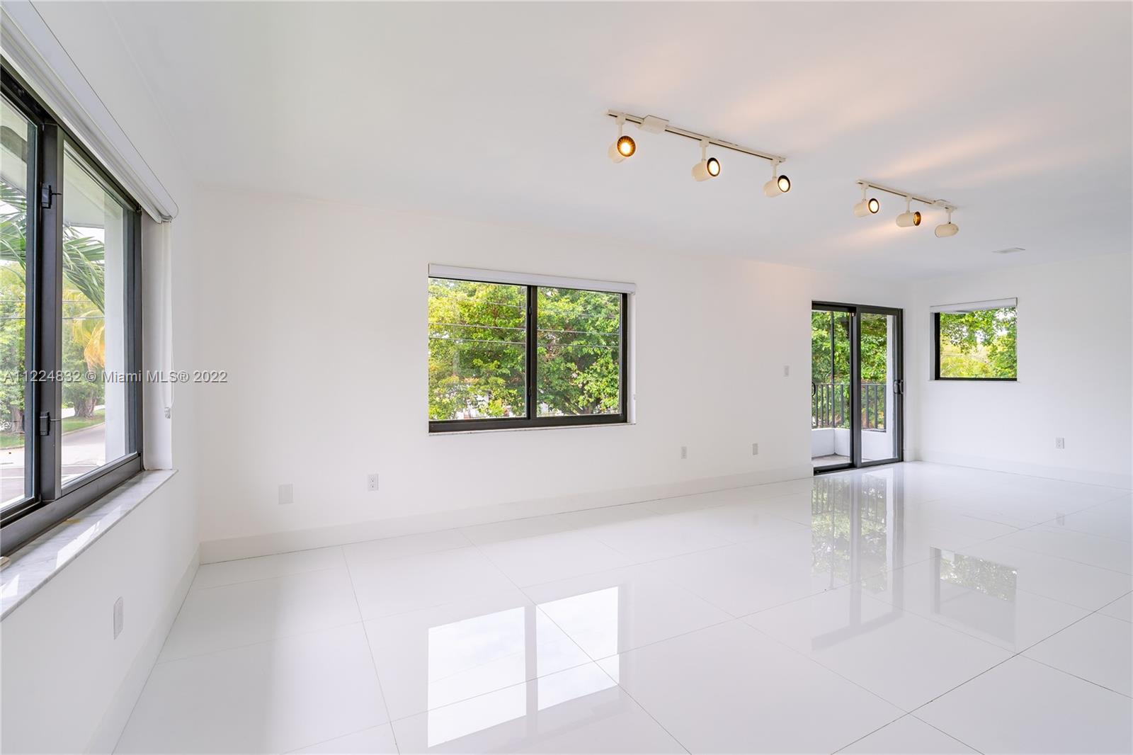 401 Southwest 23rd Road Miami, FL 33129 - Photo 19 of 25 an empty room with windows