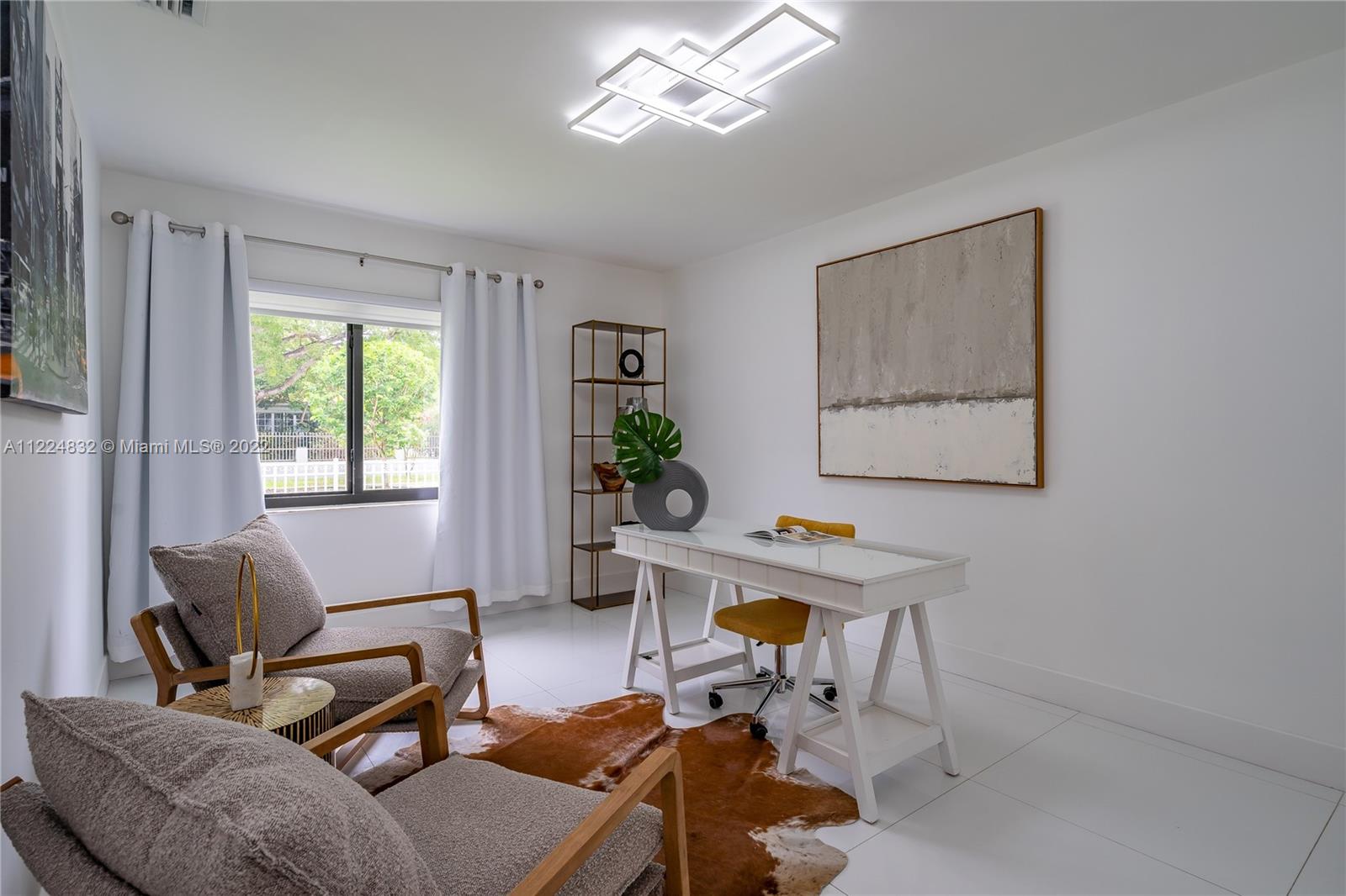 401 Southwest 23rd Road Miami, FL 33129 - Photo 10 of 25 a workspace with furniture and a window