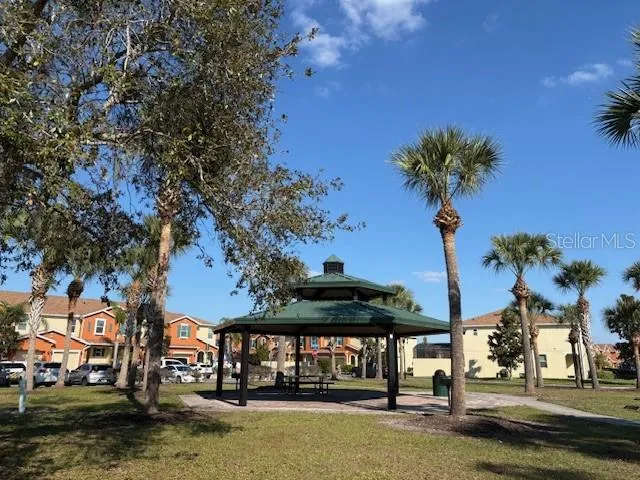 a front view of a building with garden