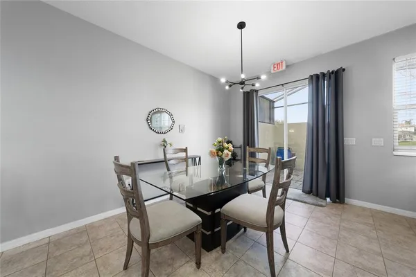 a view of a dining room with furniture