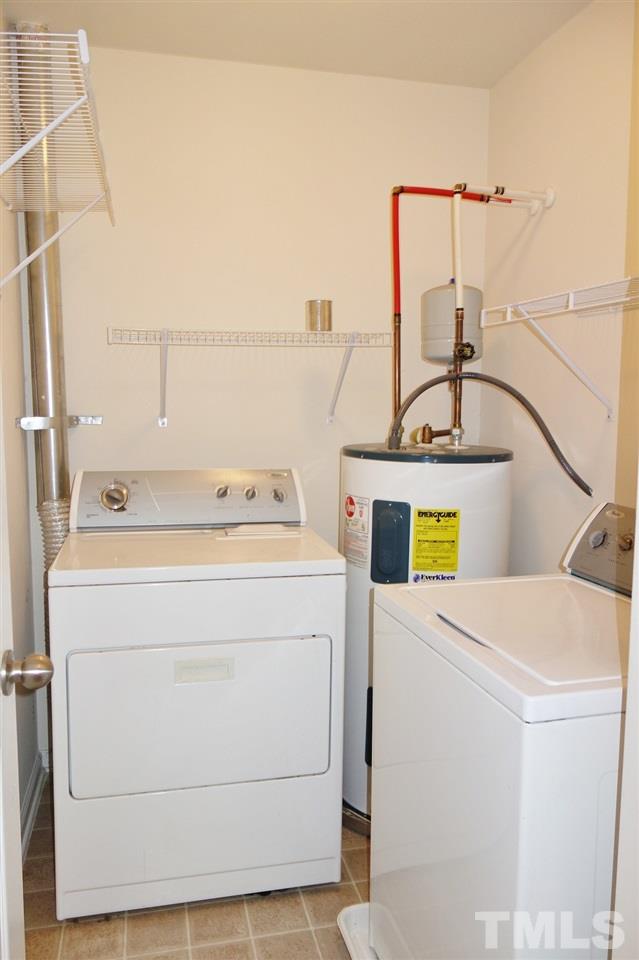 2225 Raven Road, Unit 105 Raleigh, NC 27614 - Photo 12 of 16 a utility room with dryer and washer