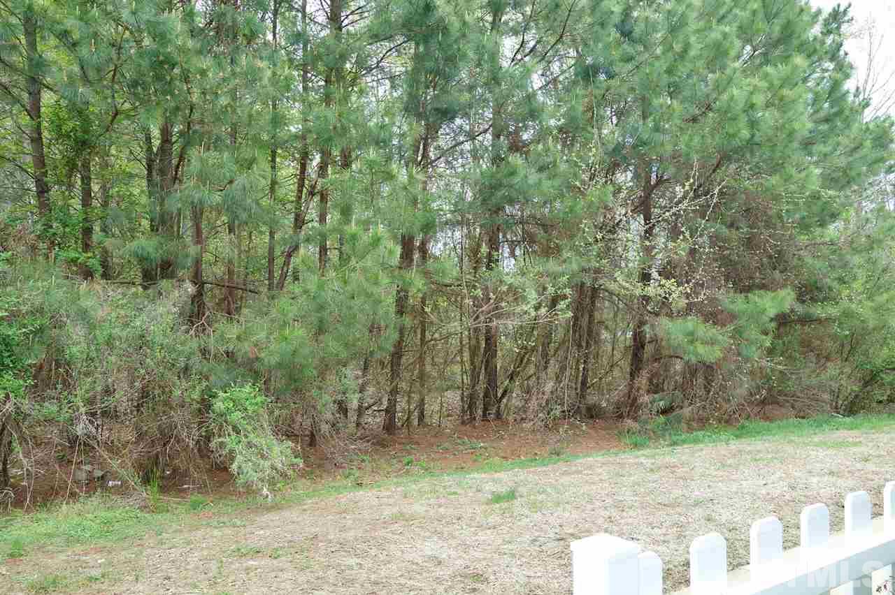2225 Raven Road, Unit 105 Raleigh, NC 27614 - Photo 16 of 16 a view of a yard with trees