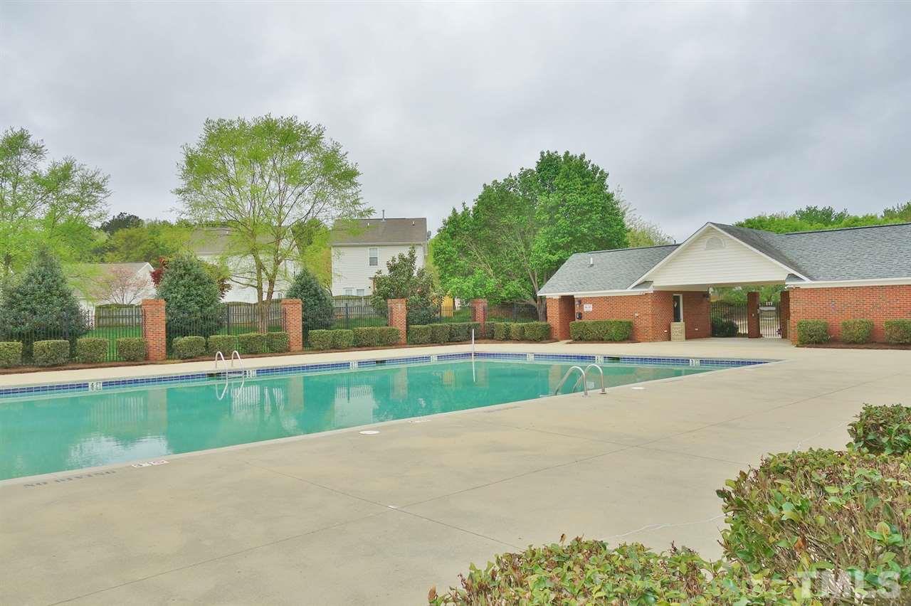 2225 Raven Road, Unit 105 Raleigh, NC 27614 - Photo 4 of 16 a front view of house with yard and green space
