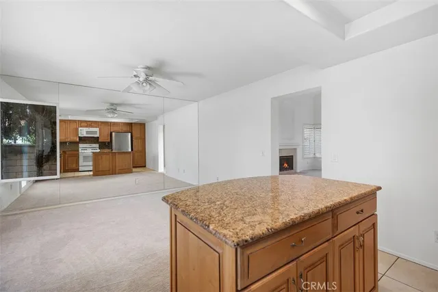a kitchen with a sink and a refrigerator