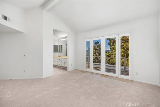 a spacious bathroom with a double vanity sink mirror and double