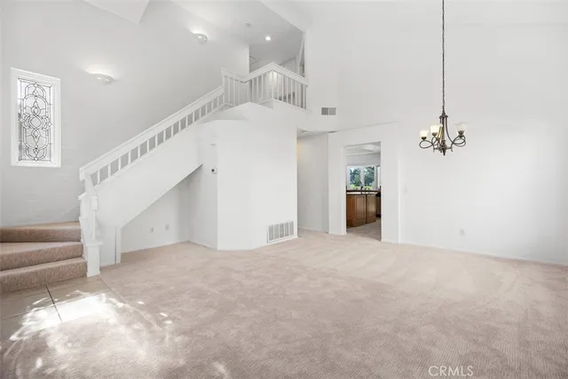 a view of a livingroom with a staircase