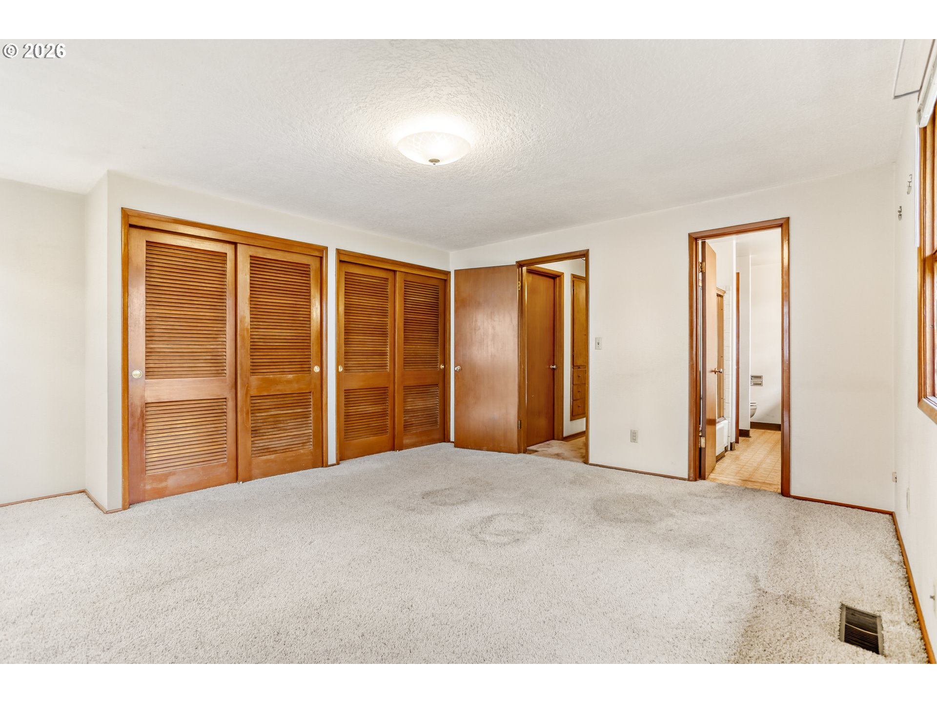 16659 Southeast Powell Boulevard Portland, OR 97236 - Photo 12 of 27 Primary Bedroom