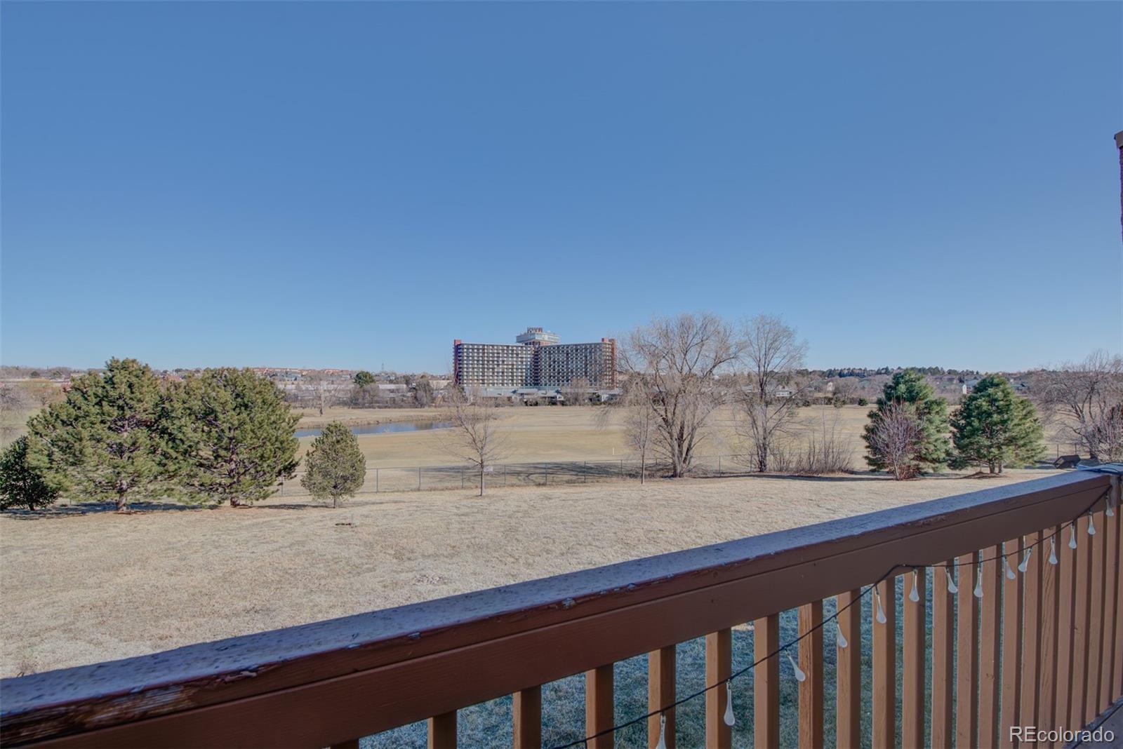 3563 Indigo Ridge Point Colorado Springs, CO 80910 - Photo 3 of 28 a view of a city from a balcony