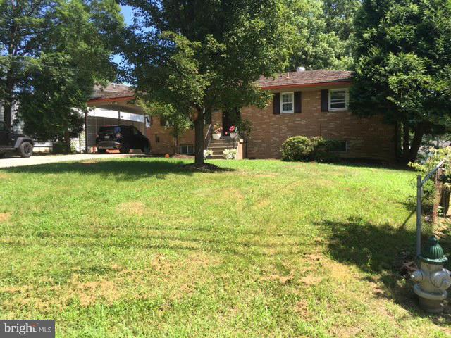 8506 Schultz Road Clinton, MD 20735 - Photo 2 of 30 a house view with a garden space