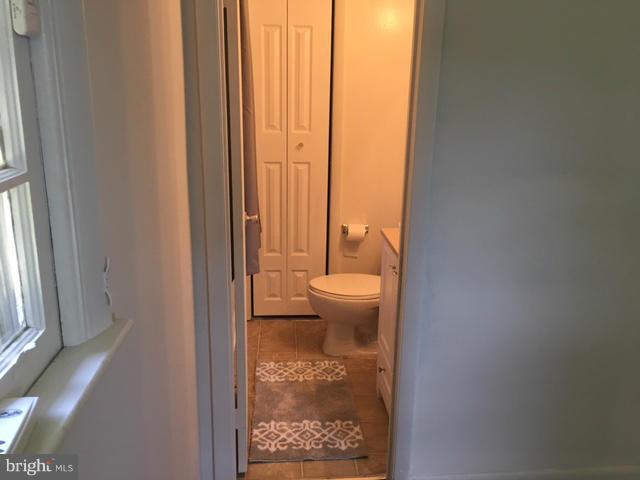 8506 Schultz Road Clinton, MD 20735 - Photo 14 of 30 a view of a bathroom with a toilet